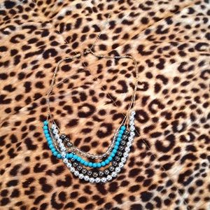 Multi string necklace