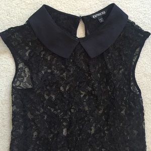 Express laced shirt with solid collar.