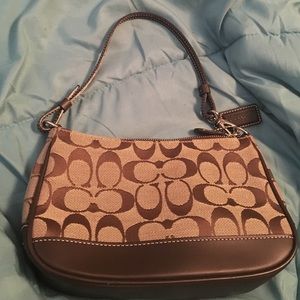Small very gently used coach clutch