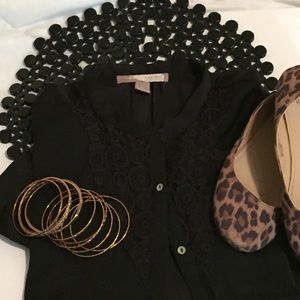 Silky black blouse with lace detail