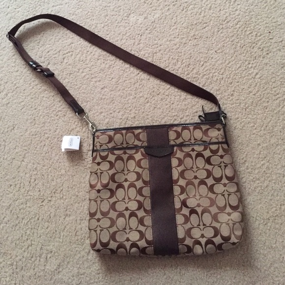 Brown Coach purse with tags