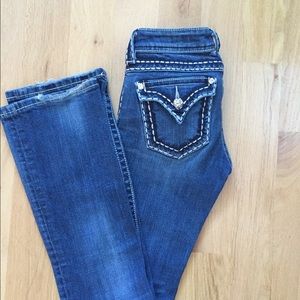 Button pocket boot cut jeans