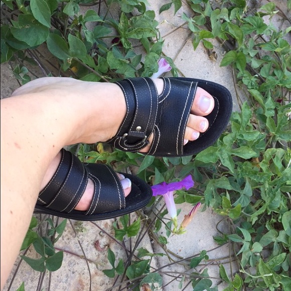 Black sandals with silver strap
