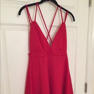 Weekend deep plunge, cross strapped dress