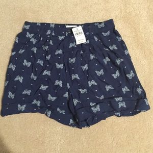 blue patterned flowy shorts
