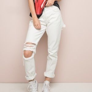 white Brandy Melville jeans w hole in back