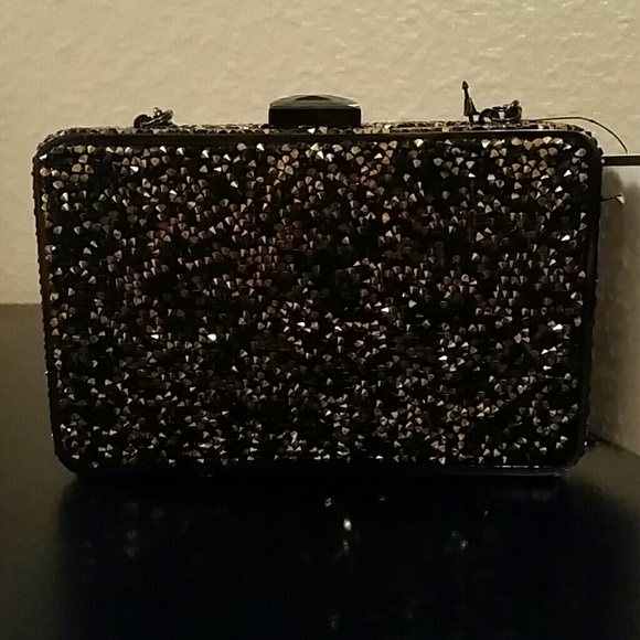 Gold and black sparkly clutch with chain