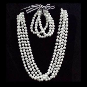 90" strand Pearl set with matching bracelets.