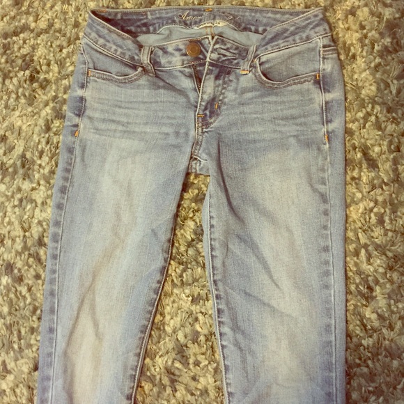 AE skinny light blue wash jeans