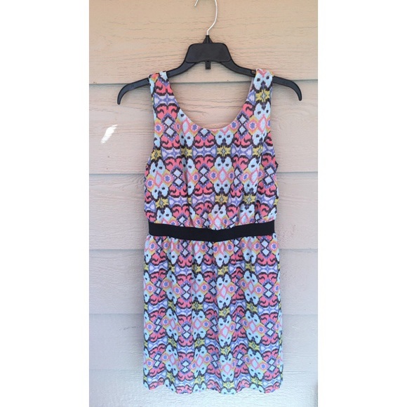 Bright, high waisted skater dress with open back.