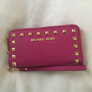 Hot pink Michael Kors studded wristlet