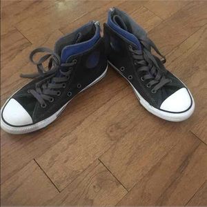 Black and blue converse high tops