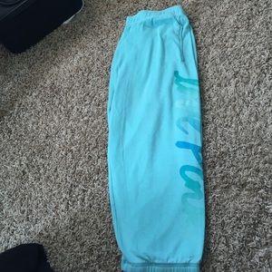 pink Capri sweat pants.