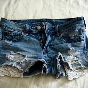Distressed lace pocket AEO shorts