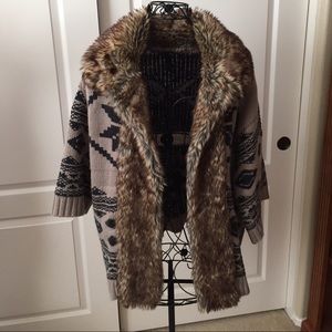 Beautiful sweater jacket with fur.