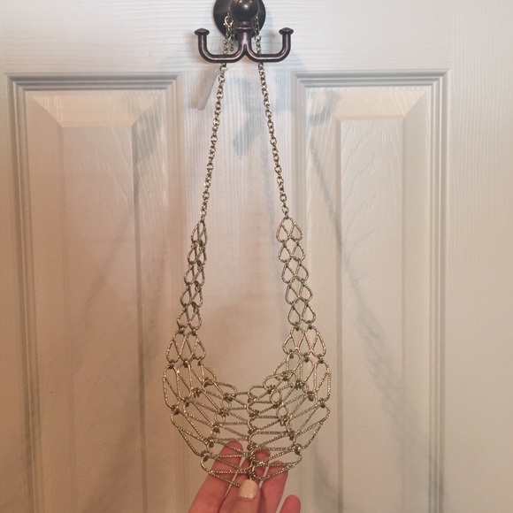 Gold colored bib necklace