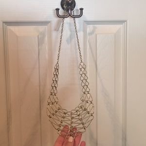Gold colored bib necklace