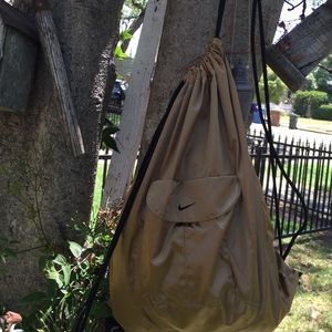Nike gold drawstring backpack