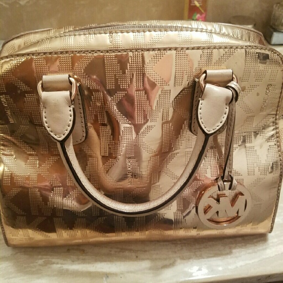 Mk rose gold purse
