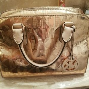 Mk rose gold purse