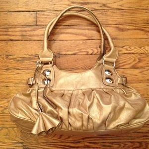 Gorgeous, golden New Directions purse