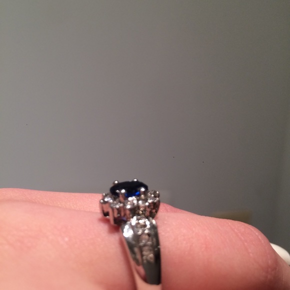 a real blue dimond ring with real dimonds arond it