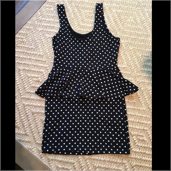 Polka dot peplum body con dress