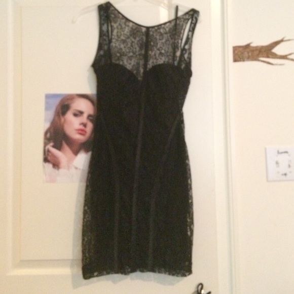 Sexy black leather and lace dress by Bebe