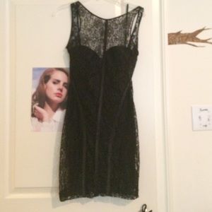 Sexy black leather and lace dress by Bebe