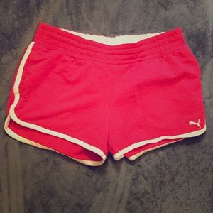 Pink and white Puma shorts