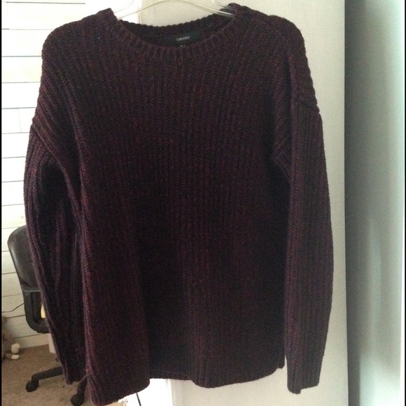 red and black stitched sweater