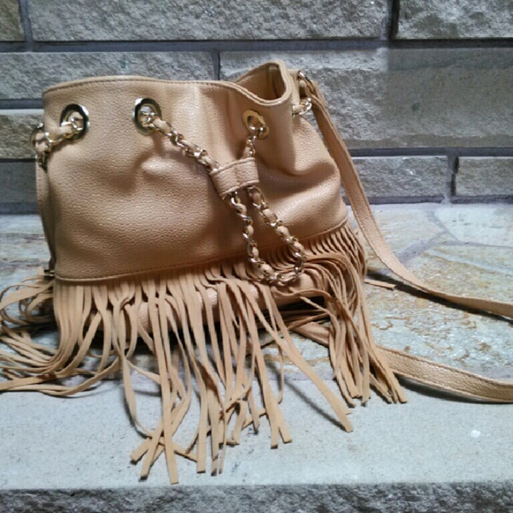 Urban Outfitters Handbags - Gorgeous tan fringe bucket bag