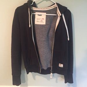 TNA form fitting navy zip up hoodie