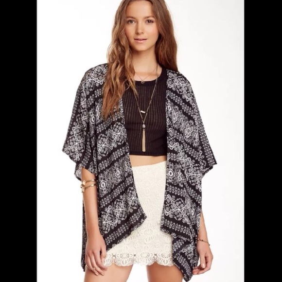 Romeo and Juliet Couture Open Cardigan