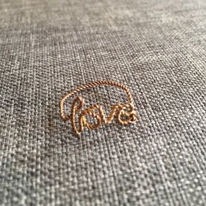 Rose gold braided "Love" ring, size 6
