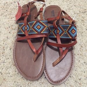 Brown Aztec patterned flats