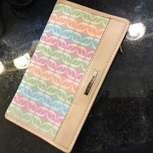 Fossil leather and fabric check book wallet.