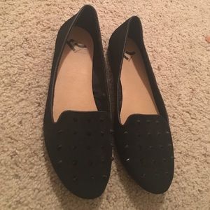 Black studded flats.