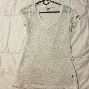 White/transparent woman's fitted tee.
