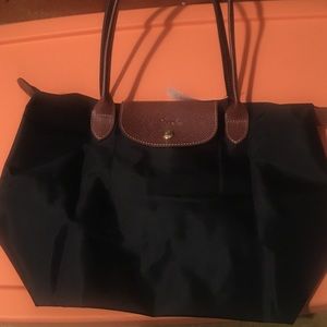 Brand new with tags Longchamp pocketbook.