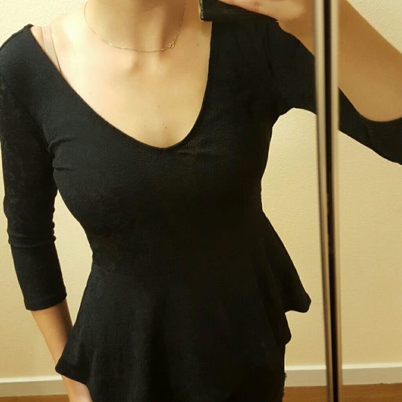 Peplum long-sleeved top