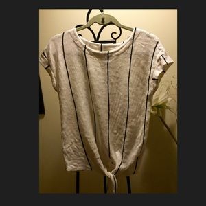 Cream shirt w/ black stripes. Cream shirt w/ black stripes.