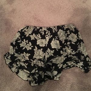 Brandy Melville black and white flower shorts