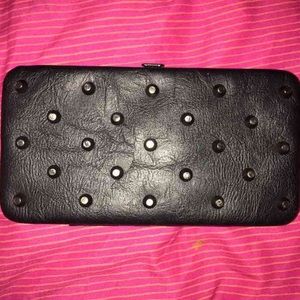 Black studded faux leather wallet from Claire's