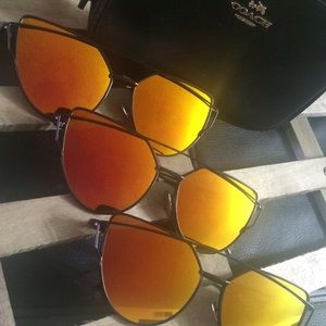 1 pair of Orange color changing mirrored sunnies