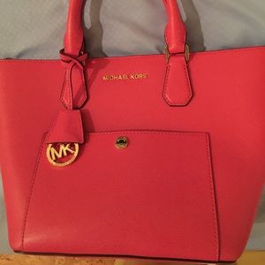 Authentic Michael Kors pink cross body handbag