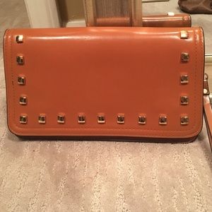 Miztrique tan and gold clutch/crossbody