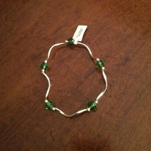 Silver and green stretchy bracelet,  New.