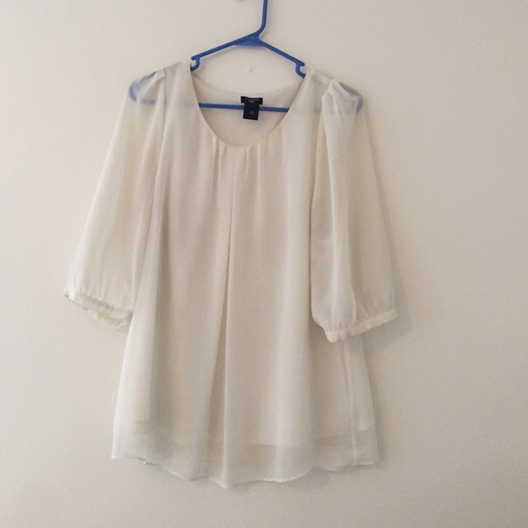 Beautiful white blouse. Sheer sleeves.