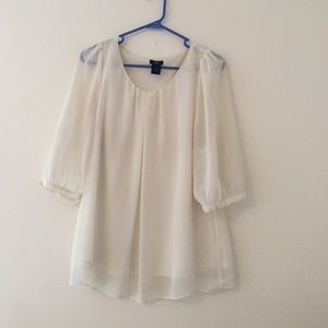 Beautiful white blouse. Sheer sleeves.